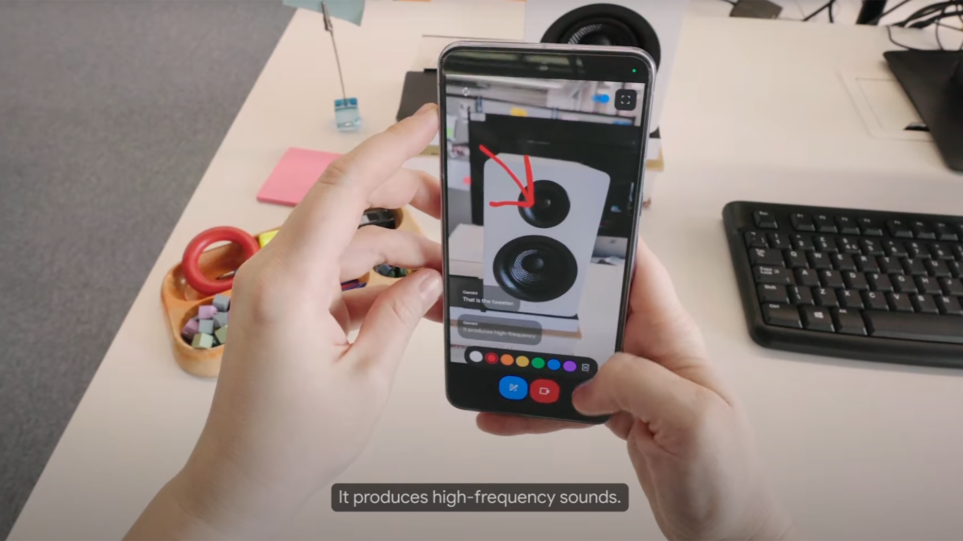 screenshot from Astra demo where user draws a red arrow on the phone screen where the phone's camera is showing the top of a speaker on a desk in the room, and Astra responds by saying the tweeter "produces high-frequency sounds."